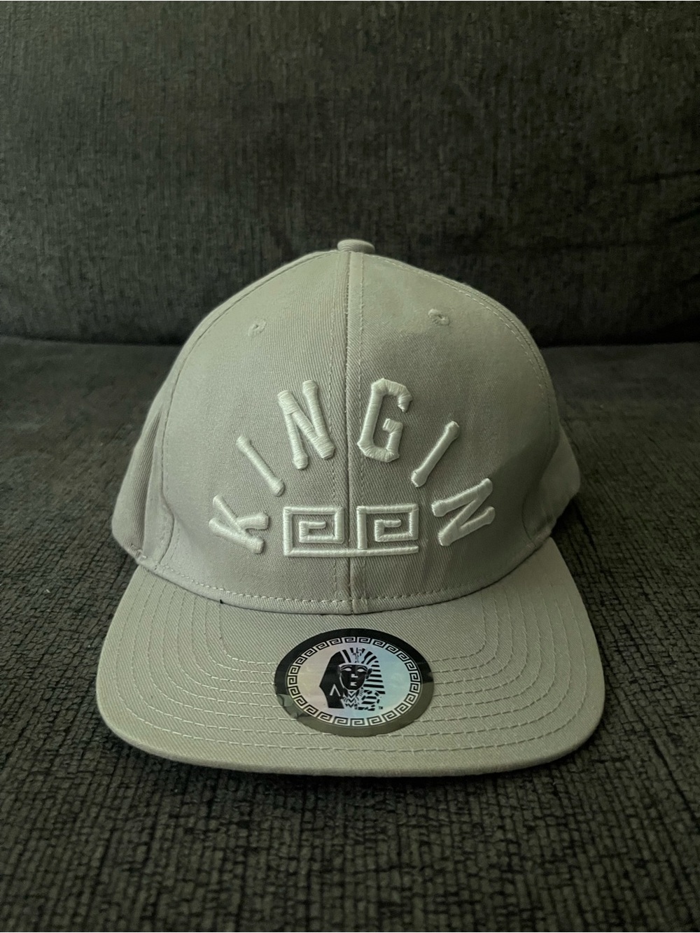 Light grey “KINGIN” arch logo SnapBack